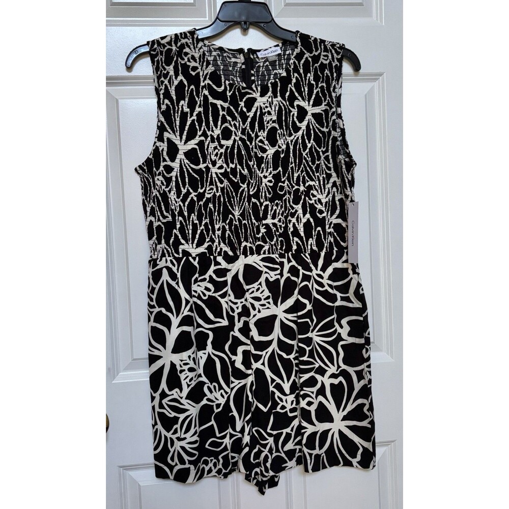 Calvin Klein Women's Jumpsuit size 14 Crinkled Black/White Floral pockets